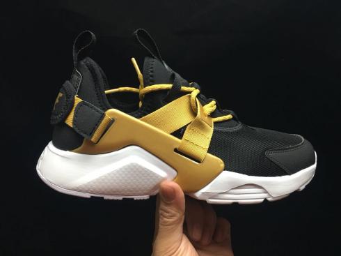 NIKE AIR HUARACHE RUN ULTRA BR ユニセックス ランニング ブラック ゴールド。