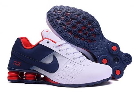 Nike Shox Deliver รองเท้าผู้ชาย Fade สีขาวสีน้ำเงินเข้มสีแดง Casual Trainers รองเท้าผ้าใบ 317547