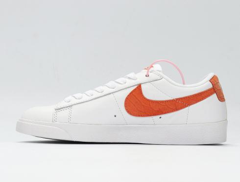 des chaussures de style de vie décontractées Nike Blazer Low Premium blanc orange pour femmes 454471-118