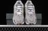 sapatos New Balance 725 cinza branco metálico prata ML725P