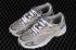 New Balance 725 sivo bijele metalik srebrne cipele ML725P
