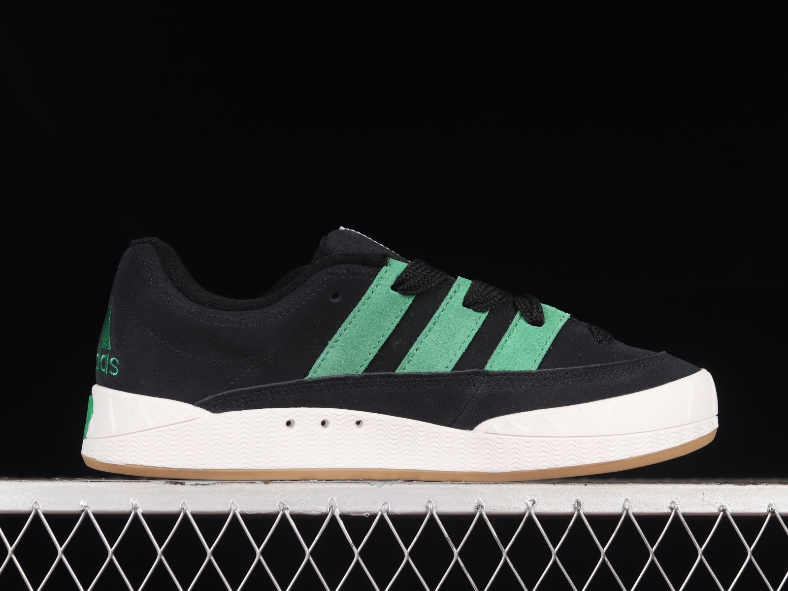 Other Adidas BrlShops Atmos x XLarge x Adidas Adimatic Core Black Green HQ3936 Short sleeves with a durable edge stitched shoulder seams and an adidas logo at the left sleeve