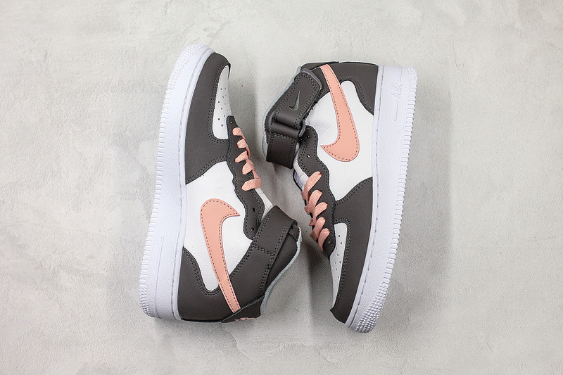 pink black and white nike air