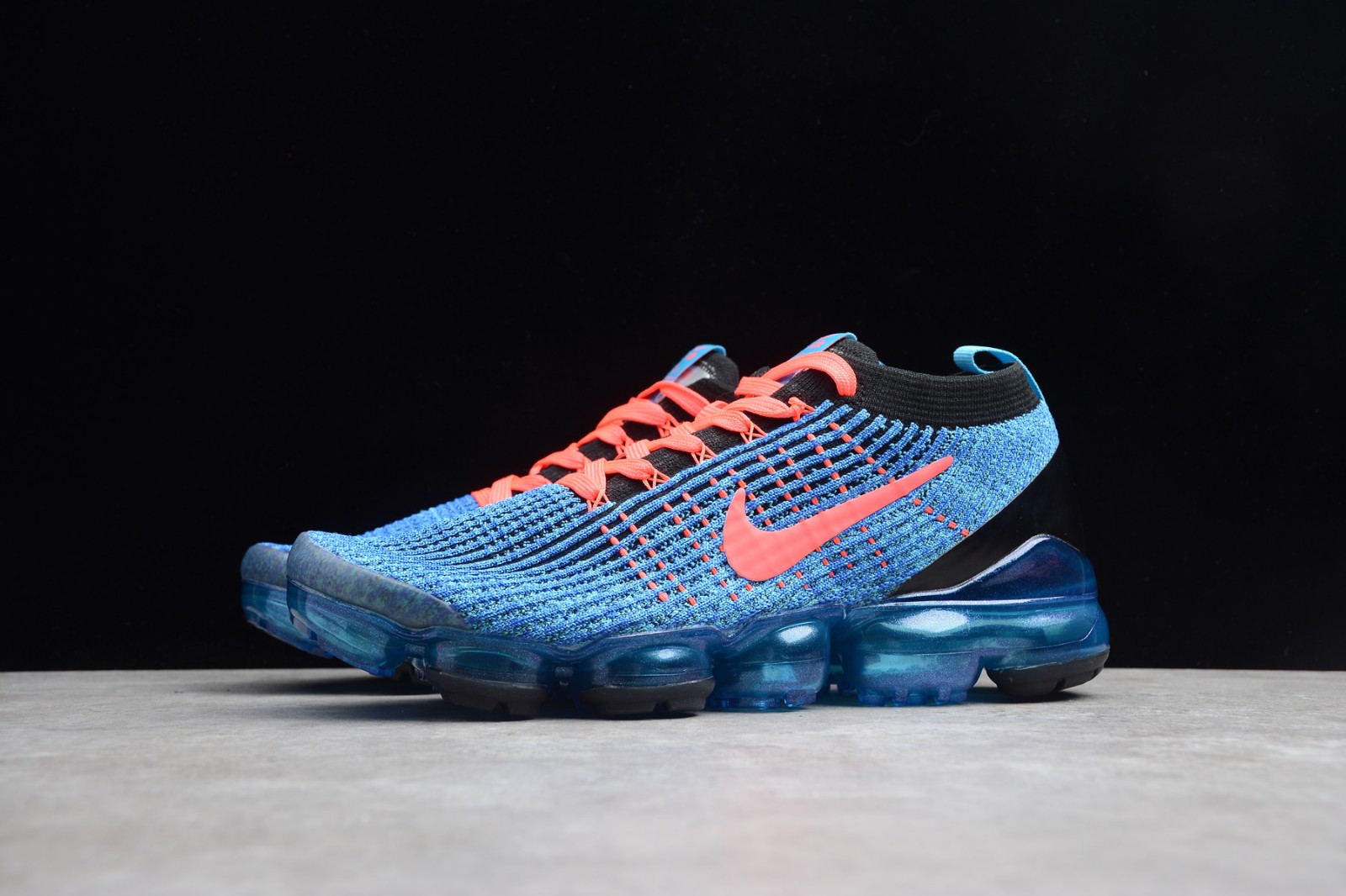 vapormax flyknit orange and blue