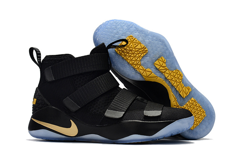 Lebron Soldiers XI 11 covering up the shoe s traditional Air Max unit and making it non visible GaleriahitShops Nike Zoom Lebron Soldiers XI 11 black gold Youth Big Kid Shoes