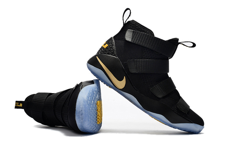 The low top sneaker Lebron Soldiers XI 11 Nike Zoom Lebron Soldiers XI 11 black gold Youth Big Kid Shoes GmarShops